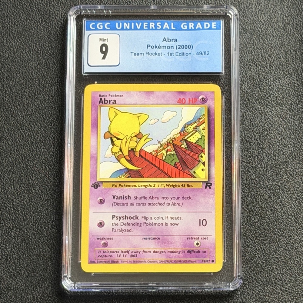 Pokemon Abra 1st Edition 49/82 CGC 9 Mint Blue Label TCG Team Rocket 2000 WotC